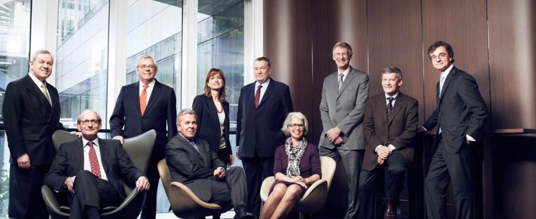 Team of employees in an office representing a small company